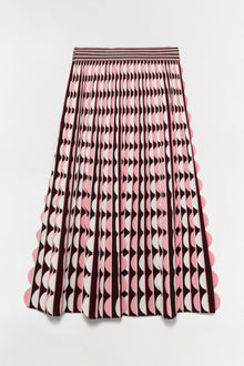 Burgundy and pink knit midi skirt with geometric pattern and scalloped hem detail.