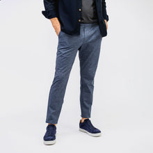 model wearing mens fusion jogger navy heather both hands in pocket