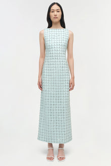 Light blue sleeveless midi dress with allover beaded embellishment and fitted silhouette.