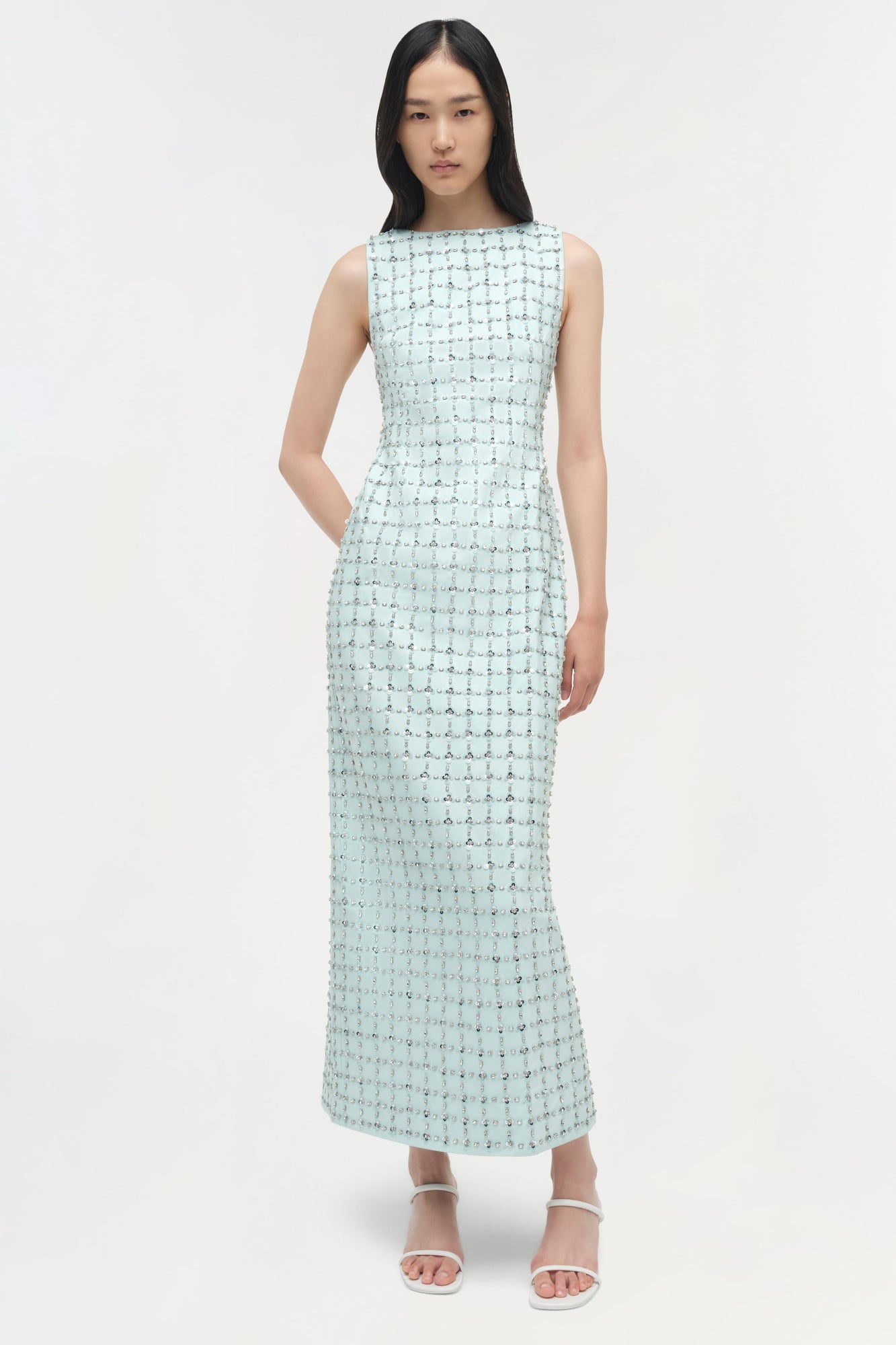 Light blue sleeveless midi dress with all-over sequin embellishments and side pockets.