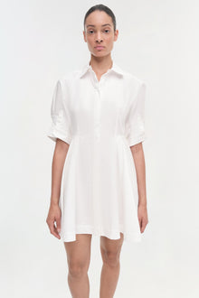White button-front shirt dress with three-quarter sleeves and a fit-and-flare silhouette.