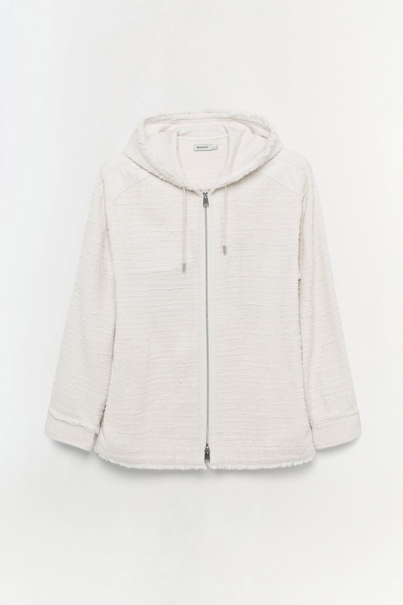 Cream-colored textured shirt jacket with hood, full-length zipper, and drawstring details.