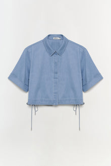Light blue denim button-up shirt with short sleeves, collar, and adjustable drawstring hem.