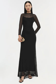 Black long-sleeve lace gown with sheer lace neckline and sleeves, fitted bodice, and floor-length skirt.