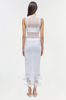 White ribbed sleeveless tank top with sheer mesh back panel, shown on model from behind.