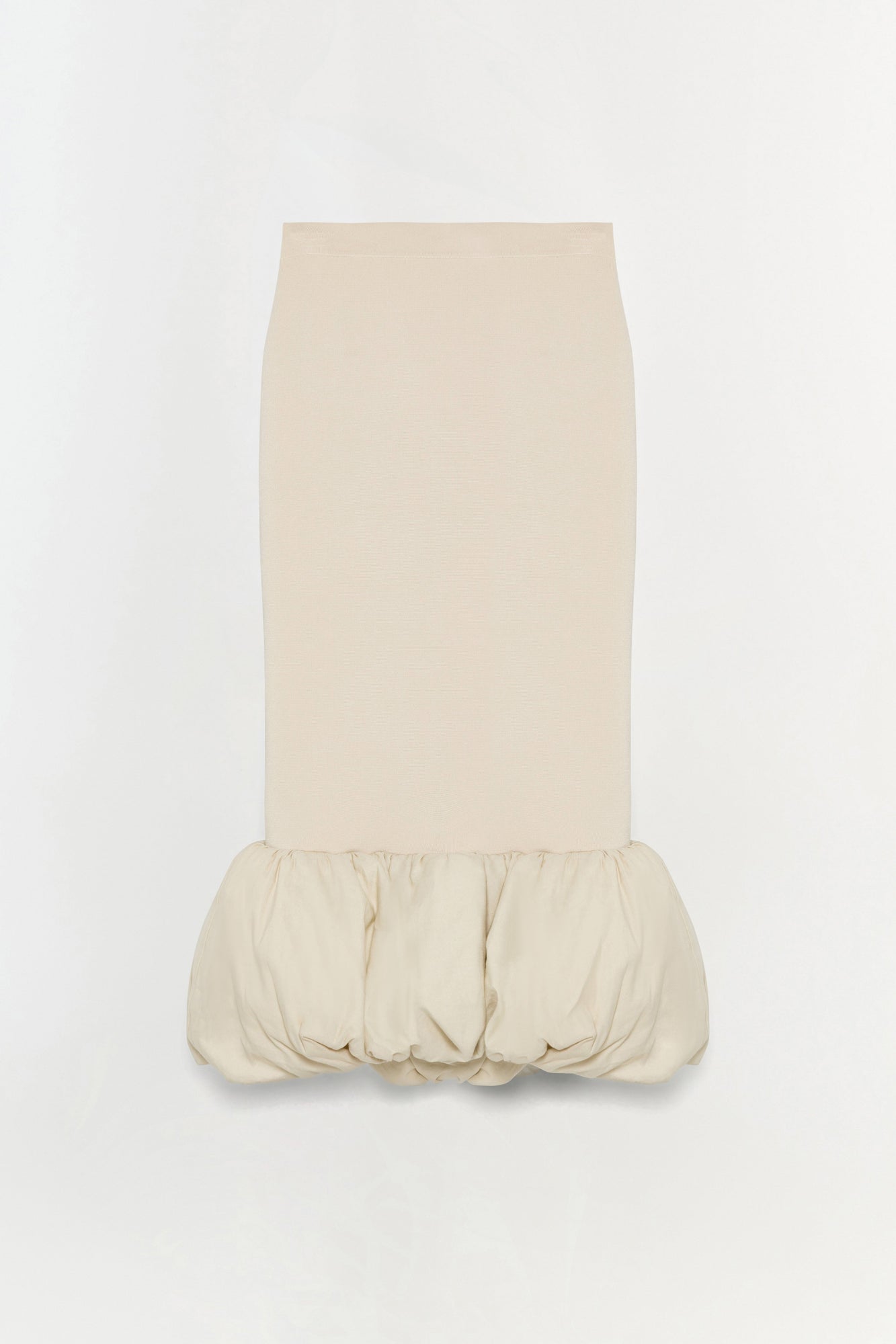 Cream-colored midi skirt with fitted body and voluminous gathered hem detail at the bottom.