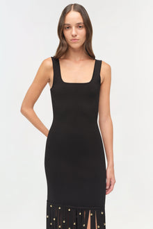 Black sleeveless knit midi dress with square neckline and gold ball embellishments on pleated hem.