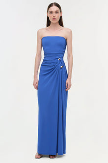Royal blue strapless gown with ruched side draping and gold buckle detail at waist.