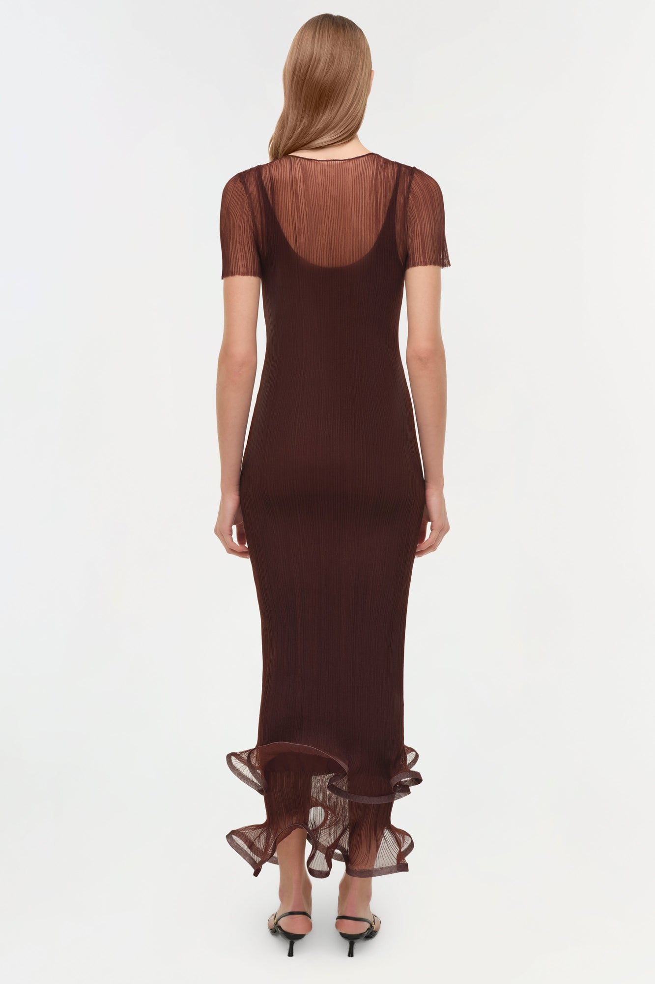 Burgundy plisse midi dress with short sheer sleeves and ruffled hem detail, shown on model from behind.