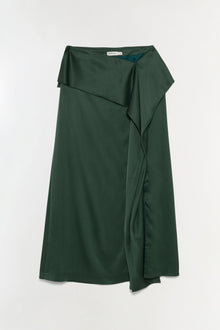 Dark green satin midi skirt with layered wrap-front design and flowing draped side panel.