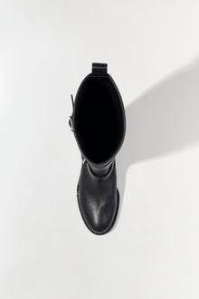 Black leather moto boot with buckle strap detail, shown from top view.
