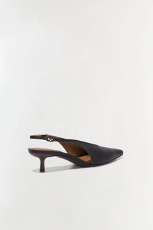 Black leather slingback heel with pointed toe and thin kitten heel, shown from the side profile.