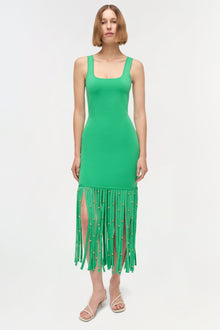 Green sleeveless knit midi dress with scoop neckline and beaded fringe hem detail.