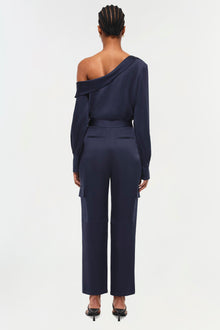 Navy Carolina Pant with high waist and cargo pockets, shown from back on model.