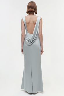 Light gray sleeveless floor-length gown with draped open back detail, shown from rear view.