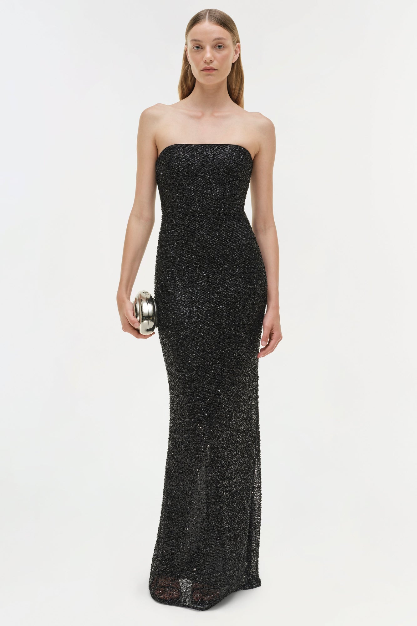 Black sequin strapless floor-length gown with fitted bodice and column silhouette.