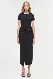 Black knit midi dress with short sleeves, crew neckline, and cinched waist with metal ring detail.