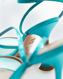 Creative view of Dani Lace up. TEAL SATIN LACE-UP WITH CRYSTAL EMBELLISHMENT Hand-crafted in Italy, the Dani (