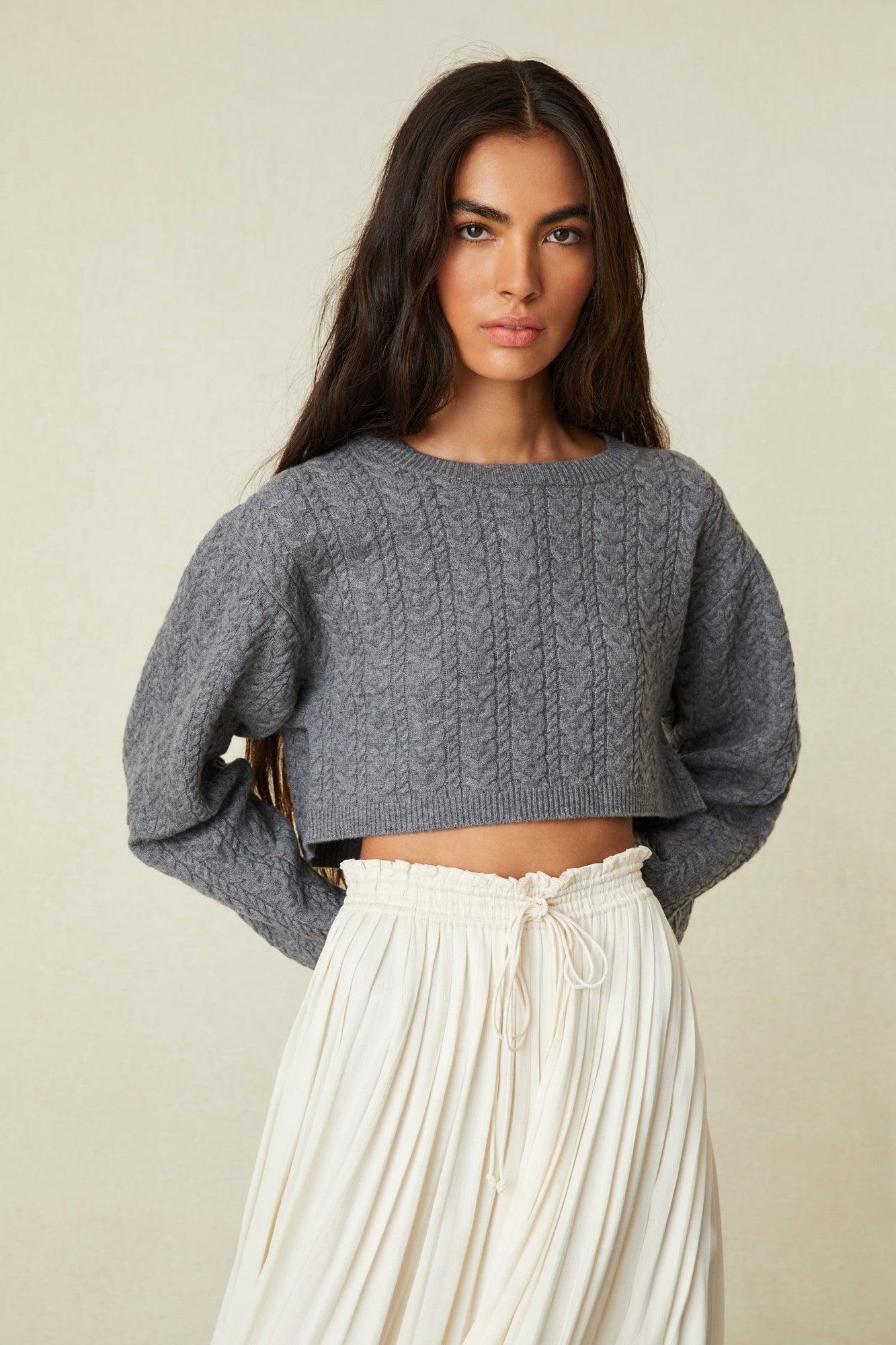 Crew Neck Cashmere Blend Sweater with long blouson sleeves and a cropped hem.