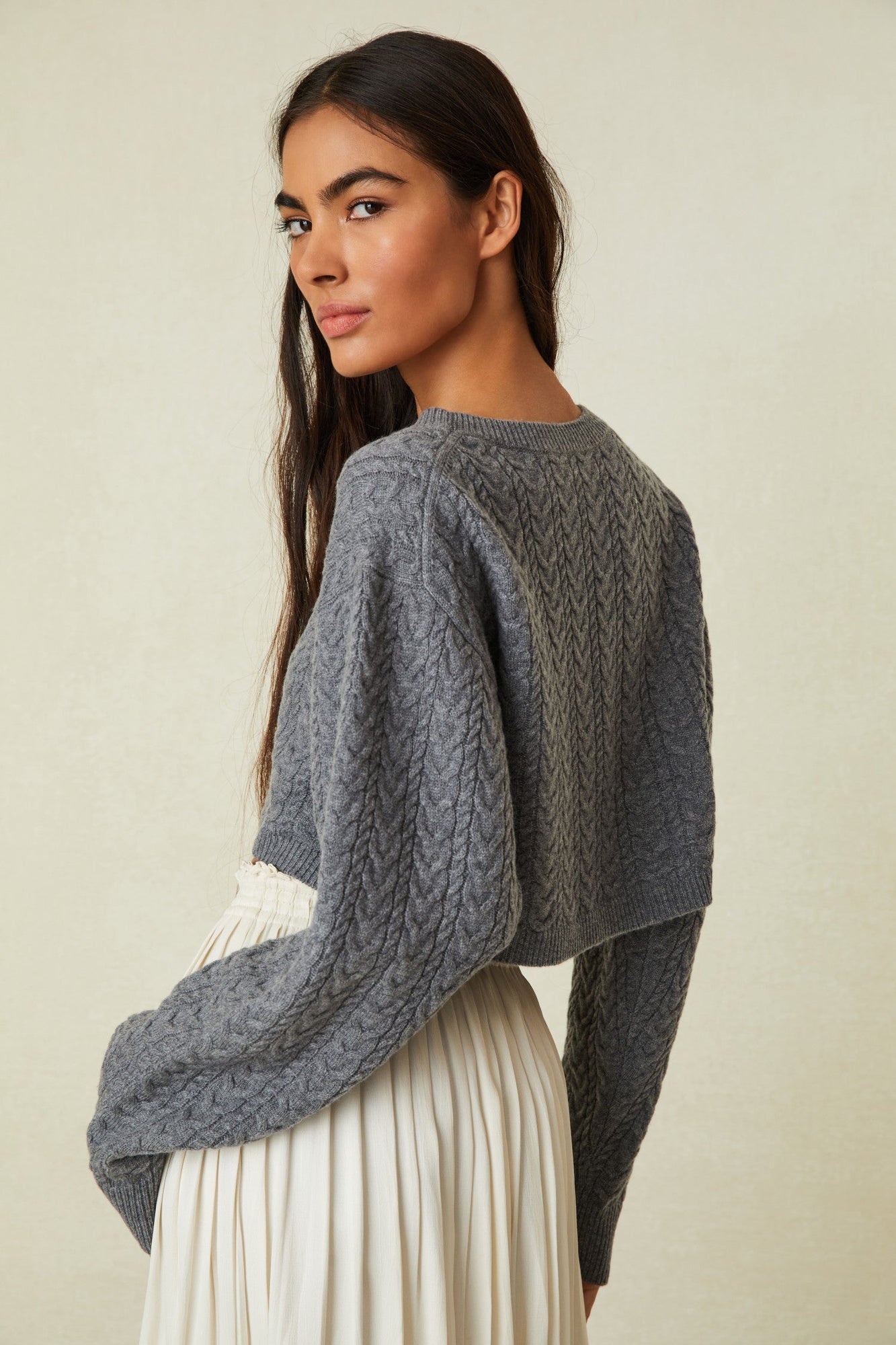 Crew Neck Cashmere Blend Sweater with long blouson sleeves and a cropped hem.