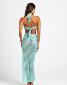 model is wearing our frozen camden set
wrap skirt ties at hip
wrap top ties at neck