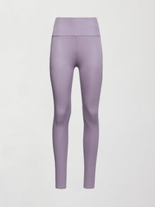 Model wears lavender grey, high-rise ribbed leggings with a fitted, full-length silhouette.