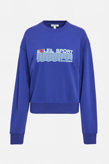 A royal blue crewneck sweatshirt with the lettering 