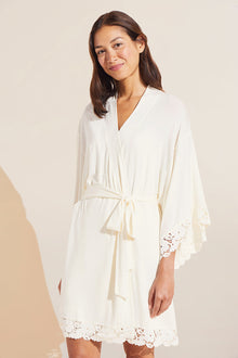 Model wears Naya TENCEL Modal Robe in ivory.