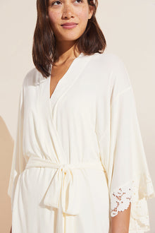 Model wears Naya TENCEL Modal Robe in ivory.