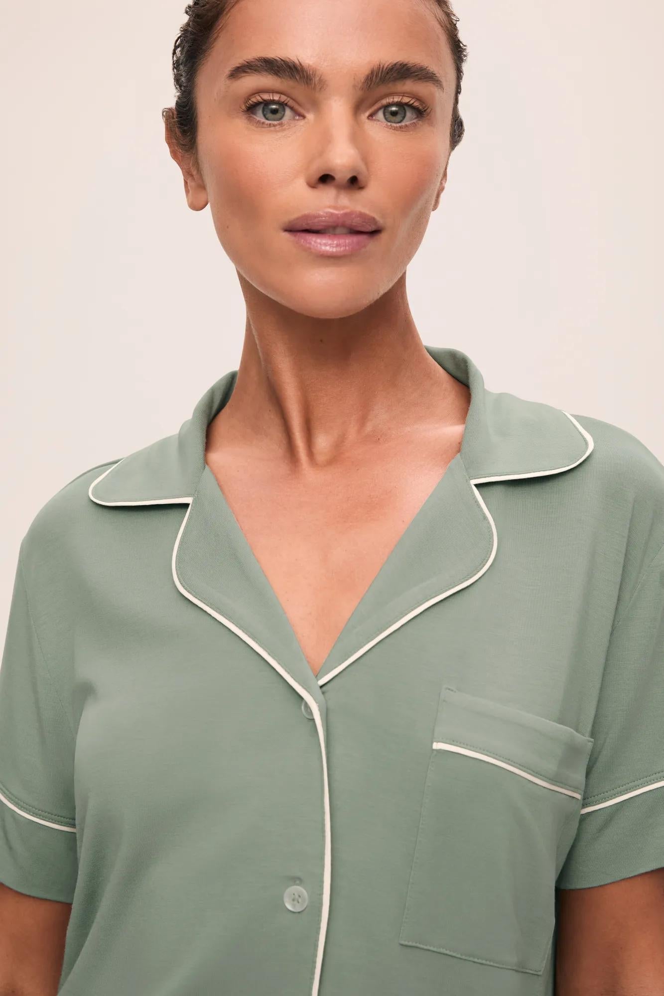Model is wearing Gisele TENCEL Modal Relaxed Short PJ Set in Eucalyptus/Ivory
