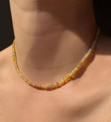 Eclipse Opal Necklace hanging on the neck