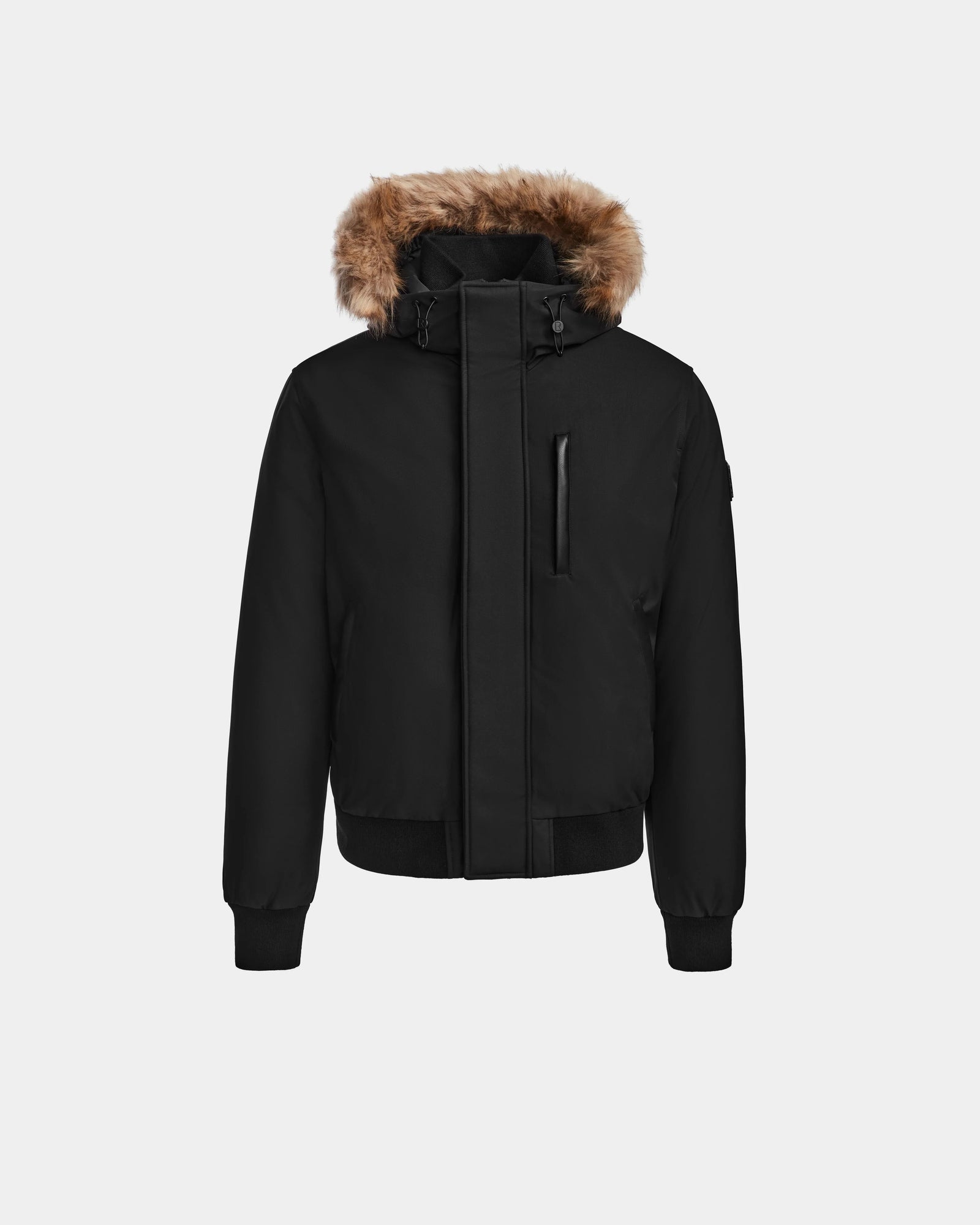 The DEACON - M123513 Black/Natural by Rudsak is a black bomber-style down puffer featuring a high collar, front zipper, ribbed cuffs and hem, detachable hood with brown faux fur trim, and recycled leather accents, shown on a plain white background.