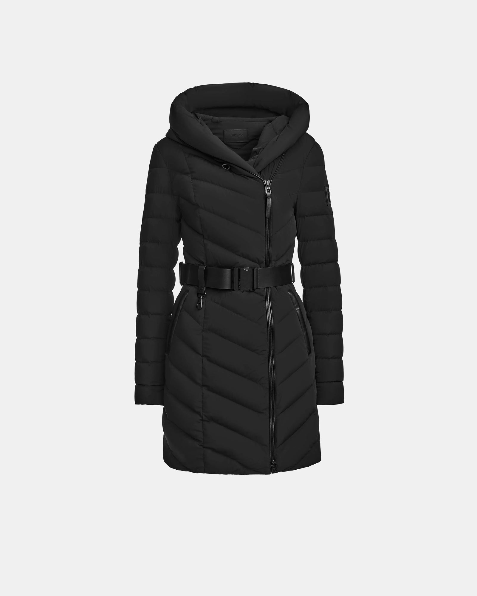 The Rudsak DITA - L124556 Black is a women's knee-length puffer jacket with a hood, front zipper, belted waist, diagonal quilting, and RDS-certified down filling, shown against a plain white background.