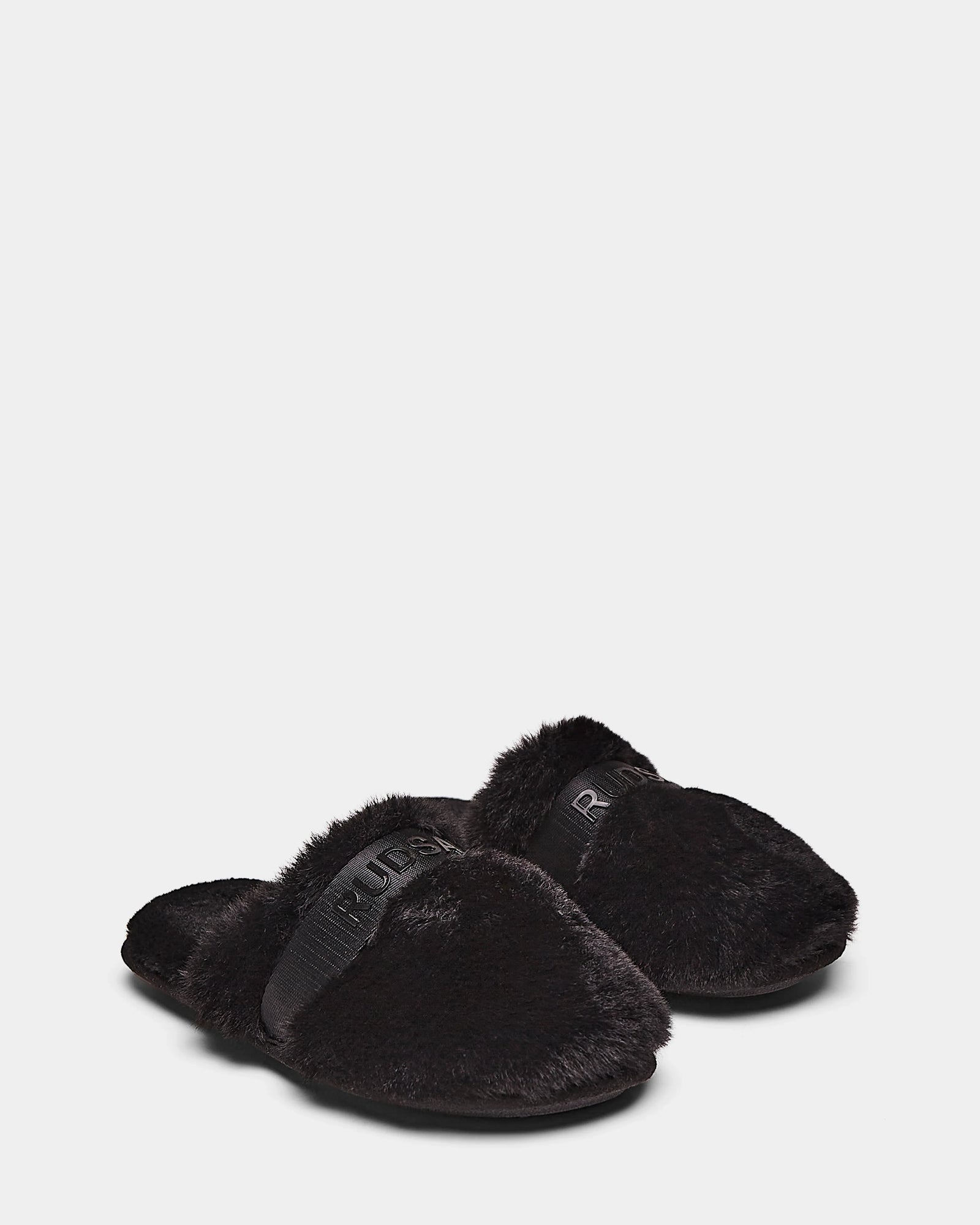 A pair of black FLUFF - L223509 women's open-back slippers by Rudsak, featuring a fuzzy soft texture and an elastic strap with subtle lettering, are shown side by side on a plain white background.