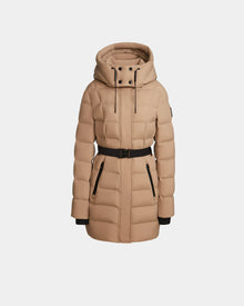 The FRIDA M - L124524 Sand by Rudsak is a beige, knee-length womens down jacket with removable hood, black belt, zipper pockets, and front zip closure, shown on a plain white background.