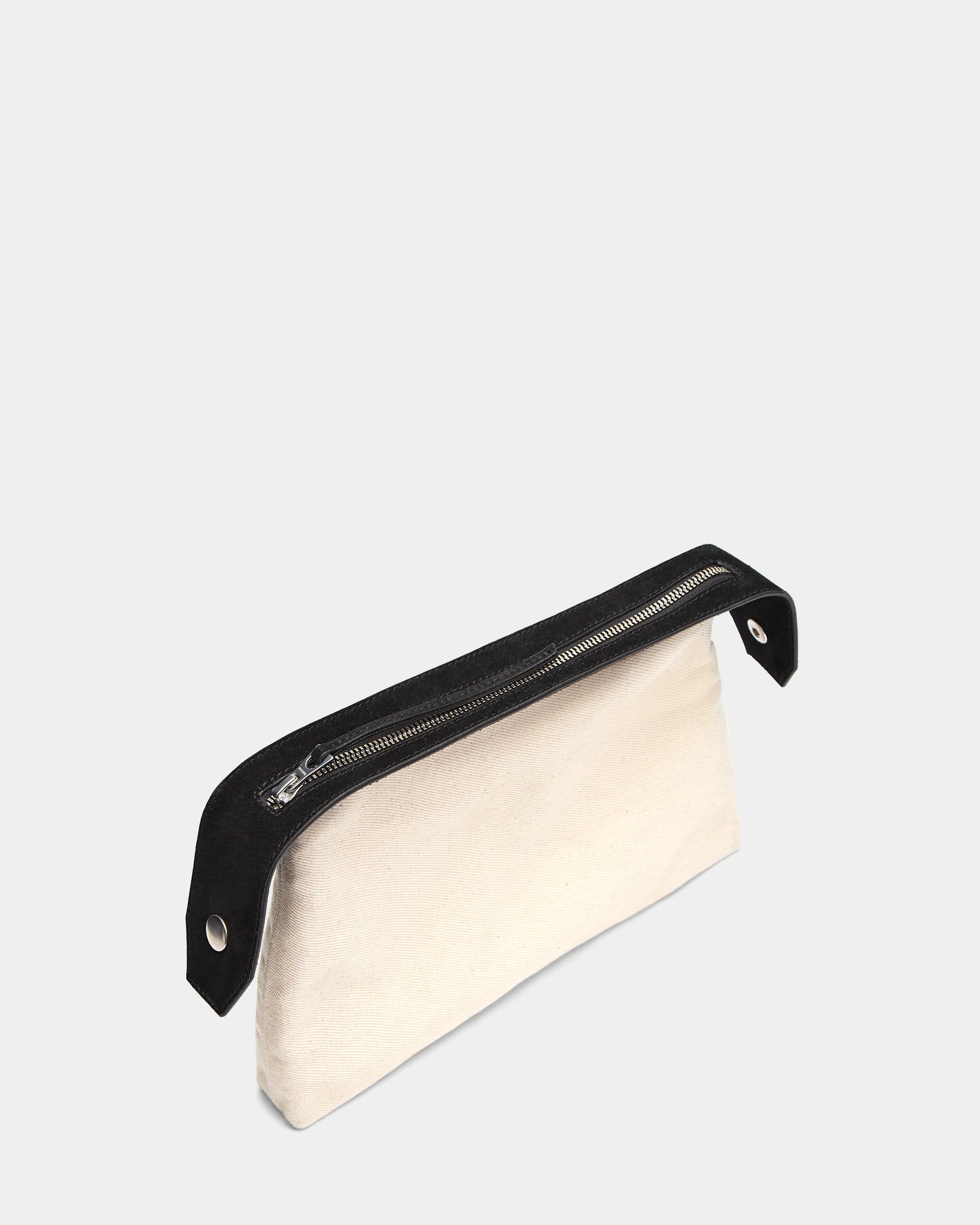 A rectangular black canvas pouch with a black zipper and trim, inspired by the Rudsak YASMINA L CS - 8324524 Black tote bag, features metal grommets at each end and is displayed on a light gray background.