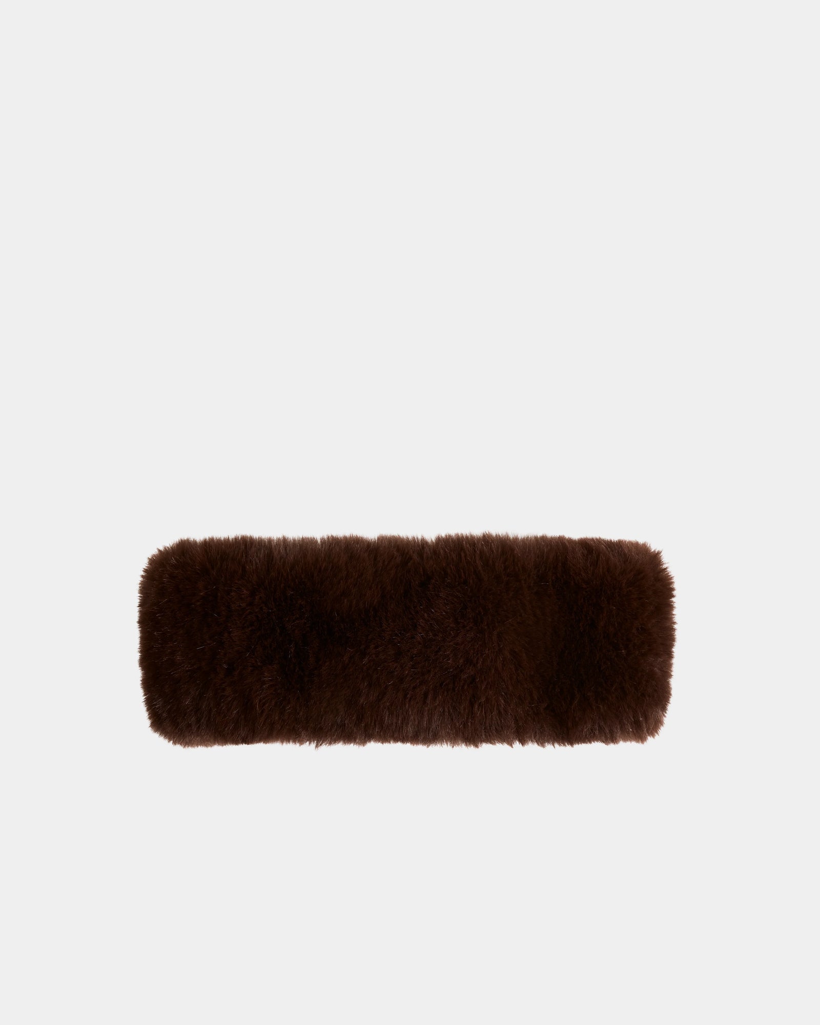 The SANDIE - L425552 Espresso by Rudsak is a rectangular, dark brown fluffy faux fur headband, centered on a plain light gray background—a chic winter accessory for women.