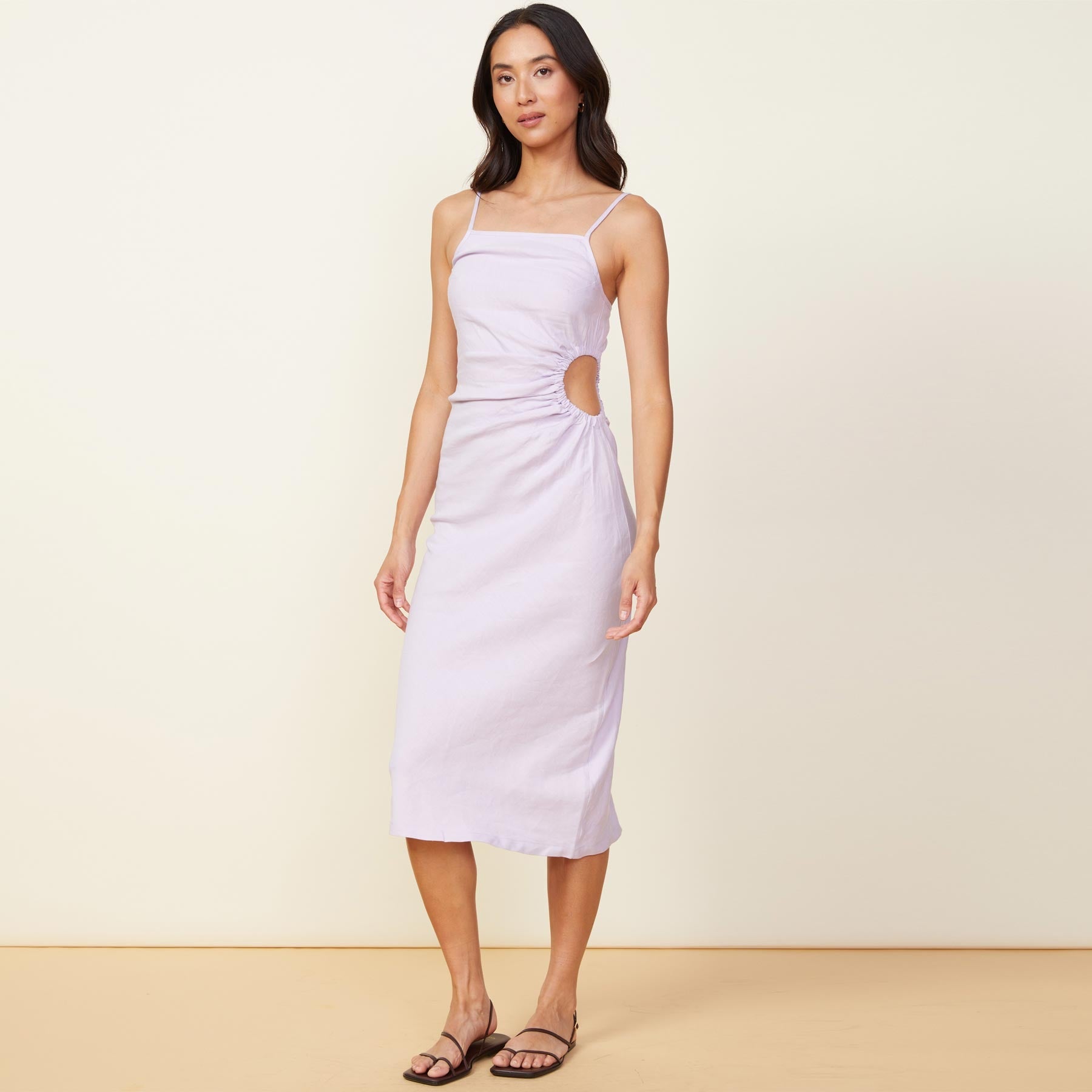 Front view of model wearing the linen slip dress in wisteria.