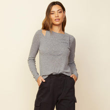 Front view of model wearing the asymmetric long sleeve top in granite.