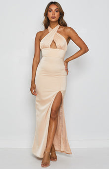 Champagne satin formal dress with a criss-cross halter neckline, underbust cutout, and a high thigh split