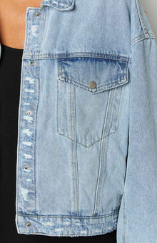 light wash oversized denim jacket with silver buttons 