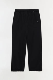 Black cotton pull-on pants with wide legs, elasticized waistband, and decorative metal eyelets at hips and waistband.