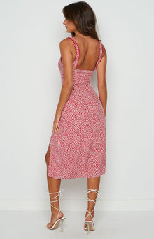 White daisy print on red dress with scoop neckline and ruffled shoulder straps