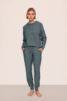 Model is wearing Softest Sweats Hoodie and Jogger in Stone Blue