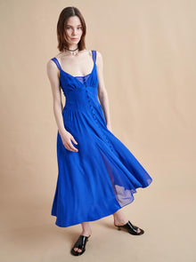 Named after supermodel and La Ligne muse, Paulina Porizkova, this gorgeous dress with sheer georgette straps and v-neckline features curve-defining shirring and smocked back panels for ease in electric blue.