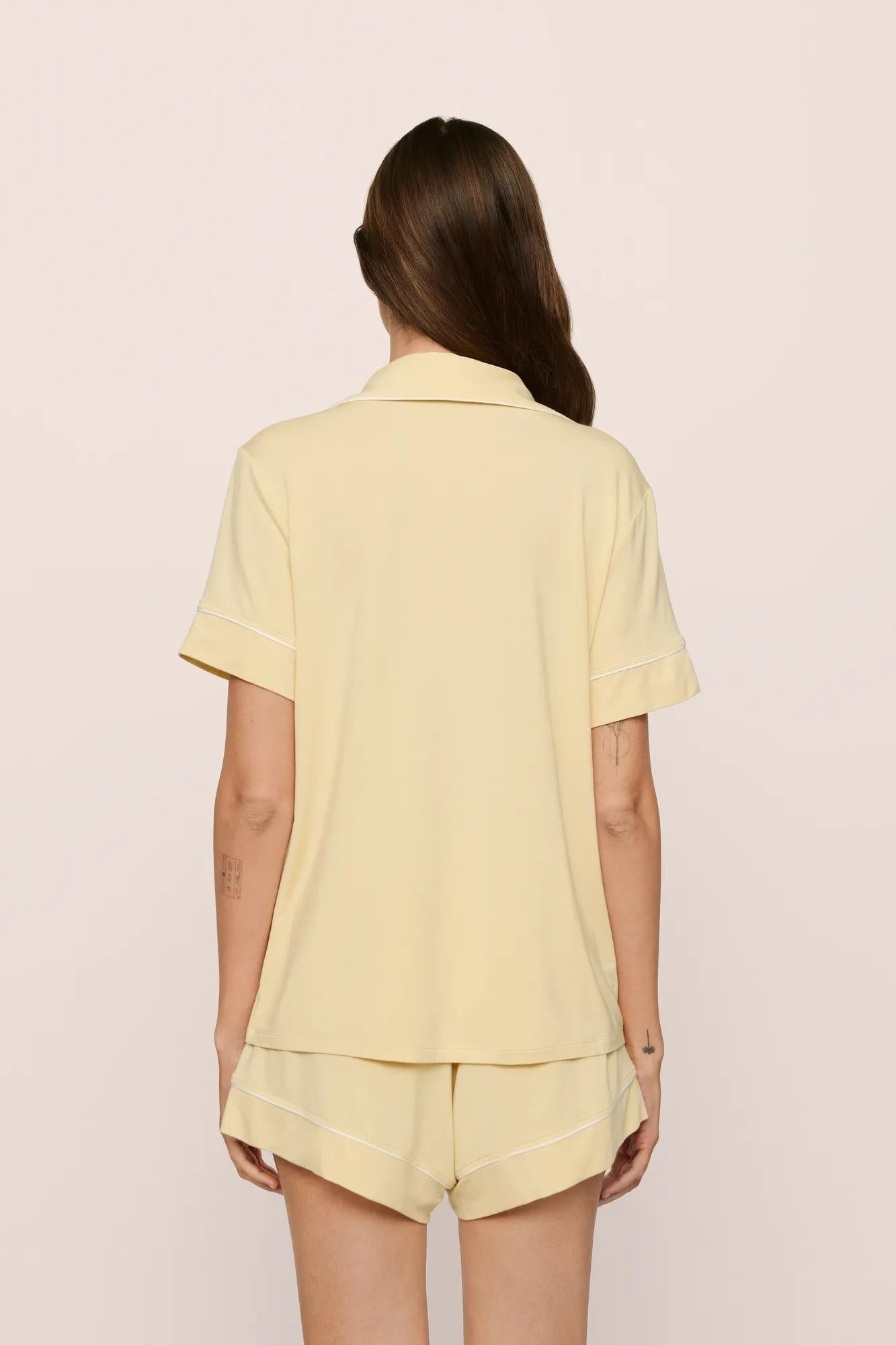 Model is wearing Gisele TENCEL Modal Relaxed Short PJ Set in  Sunrise/Ivory