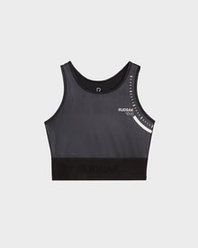 The TRACY - 8524016 Black by Rudsak is a womens high-performance black athletic crop top sports bra with white graphic details and branding on the upper left, shown against a plain white background.