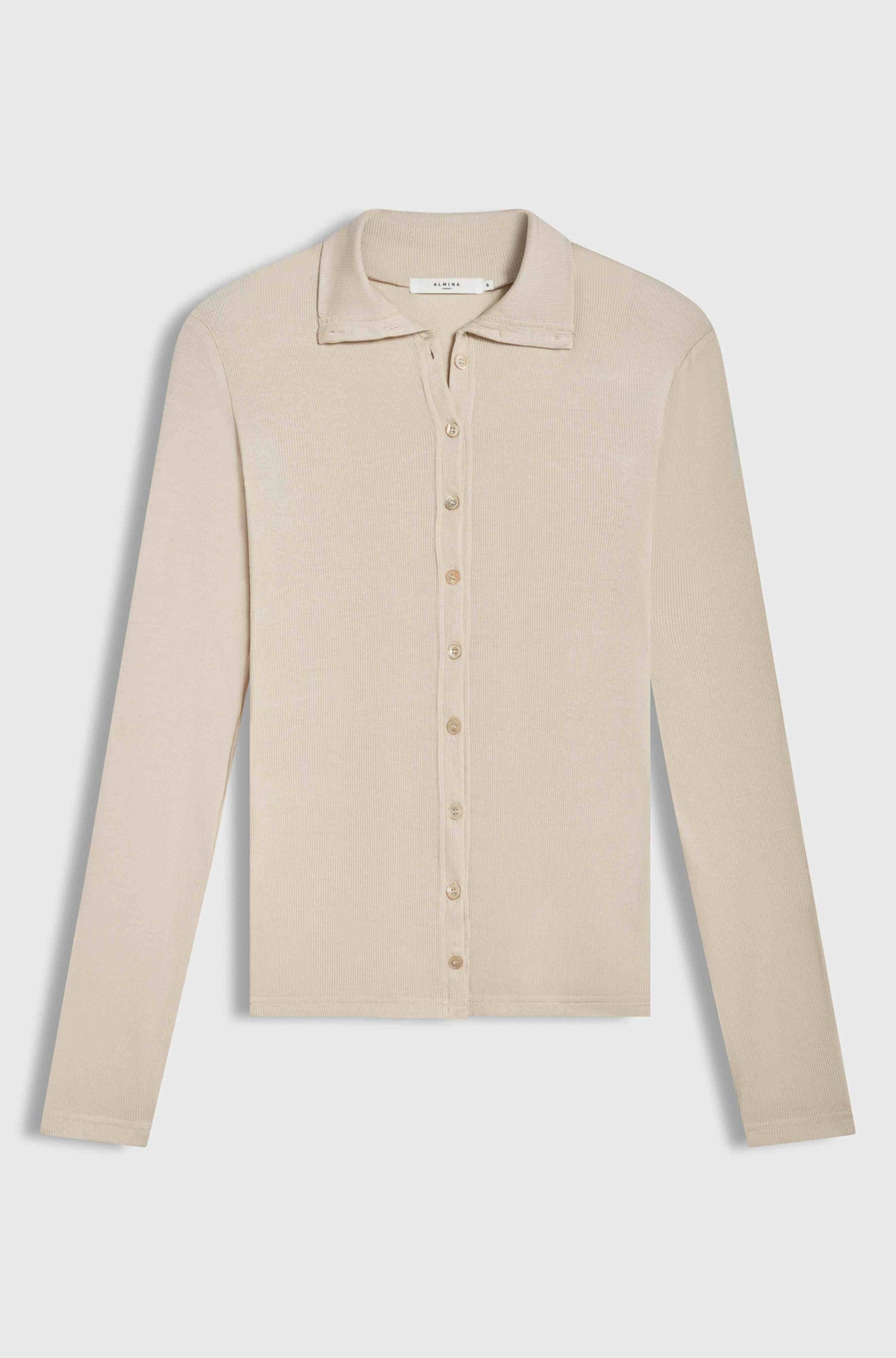 Pink button up shirt on a light grey background
