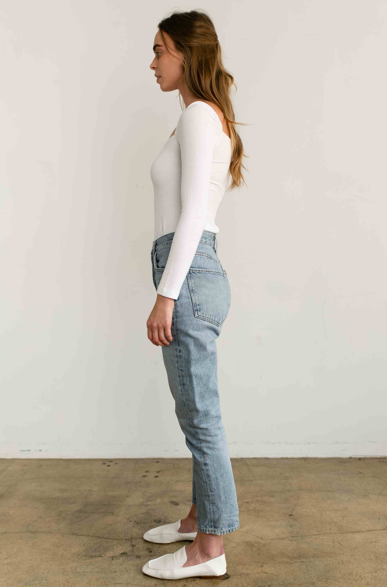 Woman wearing a white long sleeve
