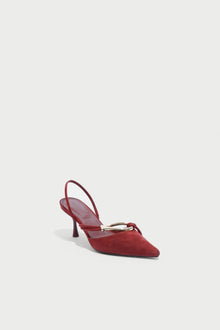 Red suede slingback heel with pointed toe and knotted strap detail across the vamp.